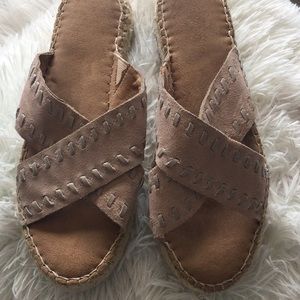 Neutral suede espadrille sandals.